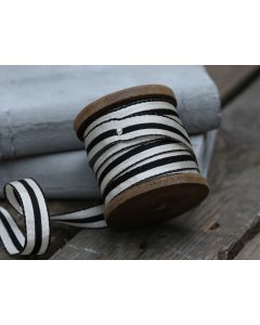 Ribbon striped on wooden spool 